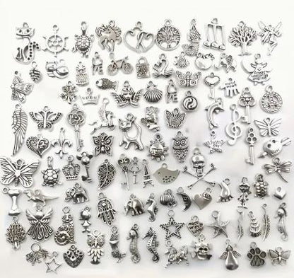 Collection of various silver charms 